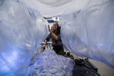 A project called "Mother Womb" a portable tent that envelops the user with calming visual, auditory and tactile sensations.